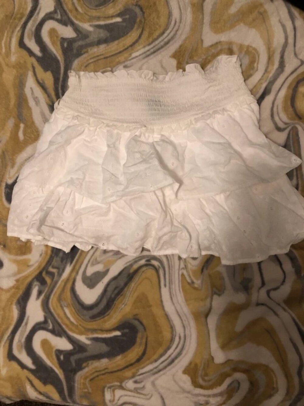 White ruffled skirt